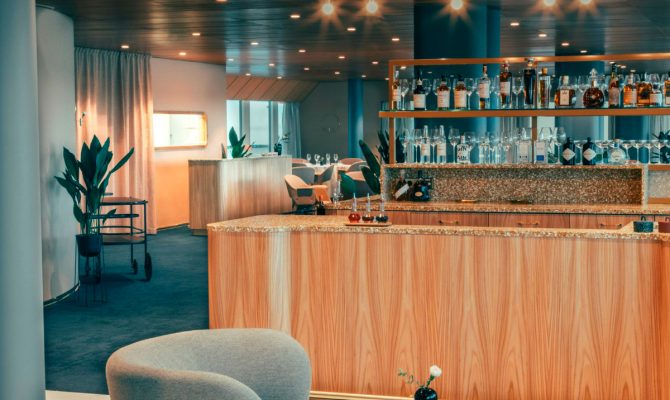 A Restaurant in Helsinki has a New Mid-Century Look | The Note Design Studio, based in Stockholm, renovated a Helsinki restaurant with beautiful pink combinations and a color scheme that truly honors the building's features. #colortrends #interiordesign #centertables #midcentury #midenturydesign