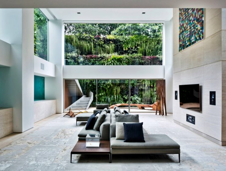 Ever Wished of Having a Pool Inside Your Home? Here's How | In an outstanding residence in São Paulo, Brazil, swimmers can be seen from the room through thick glass panels, like fish in an aquarium. #interiordesign #innovation #insidepool #homedecor