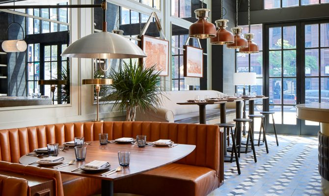 An Old Printing House Turns Into a Mesmerizing Restaurant | The place was transformed into a marvelous place full of mid-century lamps that hang above burnt orange leather booths. #interiordesign #restaurantdesign #restaurantdecor #decorideas #midcenturyideas